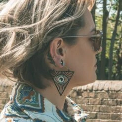 All-Seeing Eye Black Soft Touch Plug Hoops 8 All-Seeing Eye Black Soft Touch Plug Hoops -Stretch It Body Jewellery all seeing eye plug hoop model shot side shot