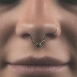 Black Onyx & Brass Seamless Septum Ring 8 Black Onyx & Brass Seamless Septum Ring -Stretch It Body Jewellery black onyx brass seamless septum ring model shot