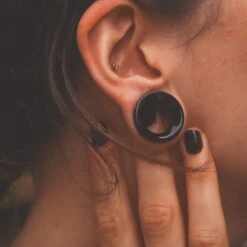 Black Onyx Double Flare Concave Stone Tunnel 8 Black Onyx Double Flare Concave Stone Tunnel -Stretch It Body Jewellery black onyx double flare concave stone tunnel model shot close up