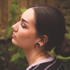 Black PVD Saddle Fit Double Flare Tunnel -Stretch It Body Jewellery black pvd saddle fit double flare tunnel model shot side shot