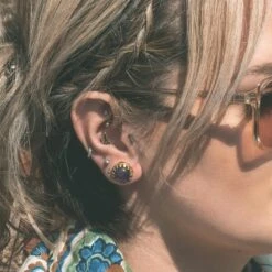 Brass Saddle Fit Double Flare Plug With Amethyst Stone Inlay -Stretch It Body Jewellery brass saddle fit double flare plug with amethyst stone inlay model shot