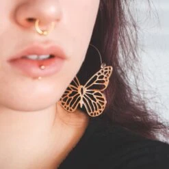 Butterfly Gold Plug Hoops -Stretch It Body Jewellery butterfly gold plug hoops model shot close up
