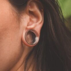 Clear Glass Double Flare Concave Plug -Stretch It Body Jewellery clear glass double flare concave plug model shot close up