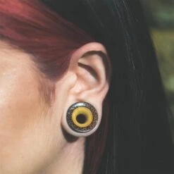 Coconut Wood Double Flare Tunnel With Crocodile Wood Inlay 12 Coconut Wood Double Flare Tunnel With Crocodile Wood Inlay -Stretch It Body Jewellery coconut wood double flare tunnel with crocodile wood inlay model shot close up