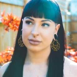 Stretch It Body Jewellery -Stretch It Body Jewellery dark synth ruby drop brass seamless septum ring model shot