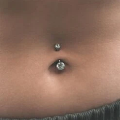 Double Aqua Jewelled Internally Threaded Titanium Belly Bar 8 Double Aqua Jewelled Internally Threaded Titanium Belly Bar -Stretch It Body Jewellery double aqua jewelled internally threaded titanium belly bar model shot