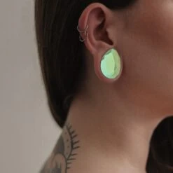 Faceted Aurora Glass Double Flare Teardrop Plug 8 Faceted Aurora Glass Double Flare Teardrop Plug -Stretch It Body Jewellery faceted aurora glass double flare teardrop plug model shot close up