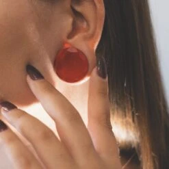 Faceted Red Glass Double Flare Plug -Stretch It Body Jewellery faceted red glass double flare plug model shot close up