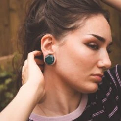 Faceted Teal Glass Double Flare Plug 10 Faceted Teal Glass Double Flare Plug -Stretch It Body Jewellery faceted teal glass double flare plug model shot