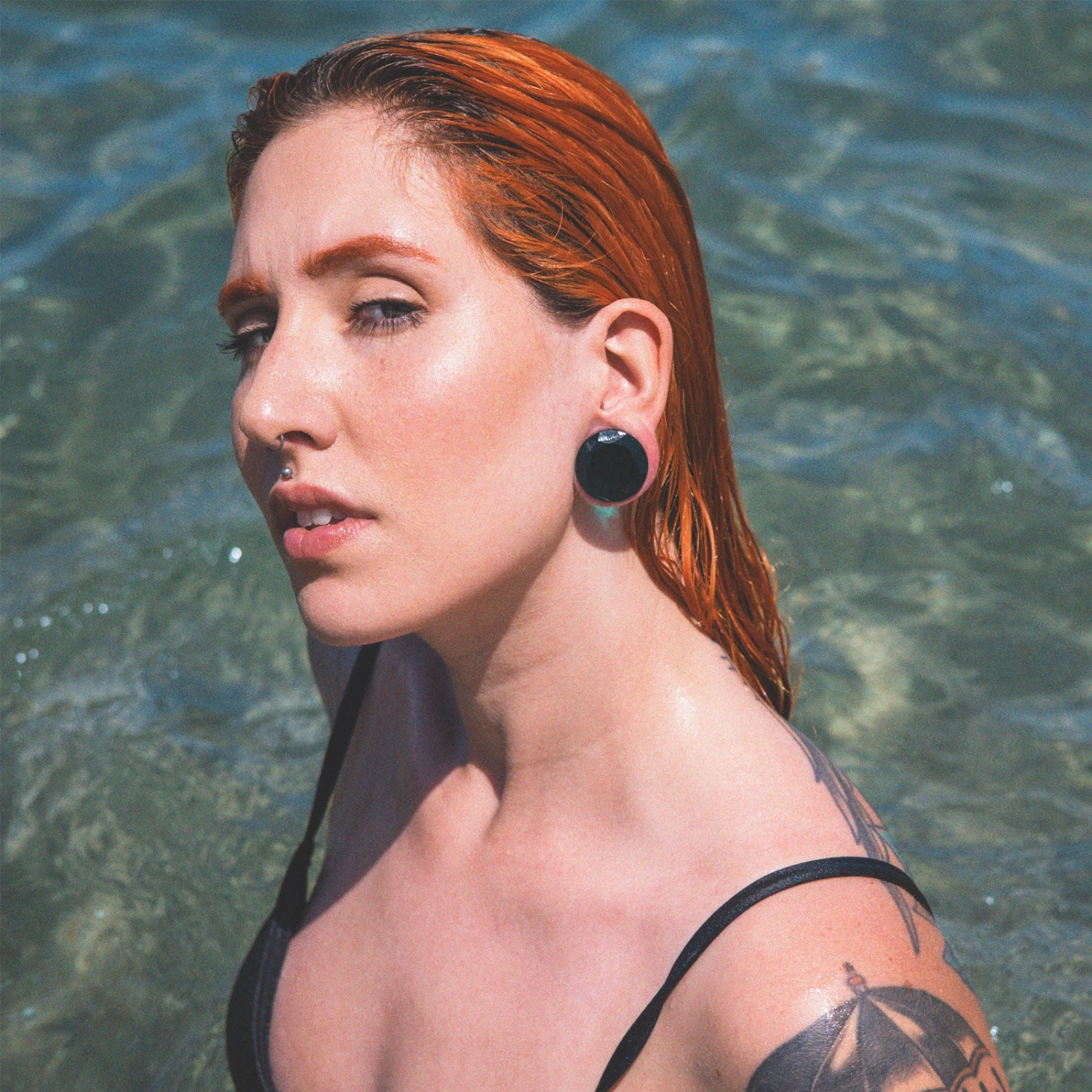 Faceted Teal Glass Double Flare Plug 5 Faceted Teal Glass Double Flare Plug - Image 3