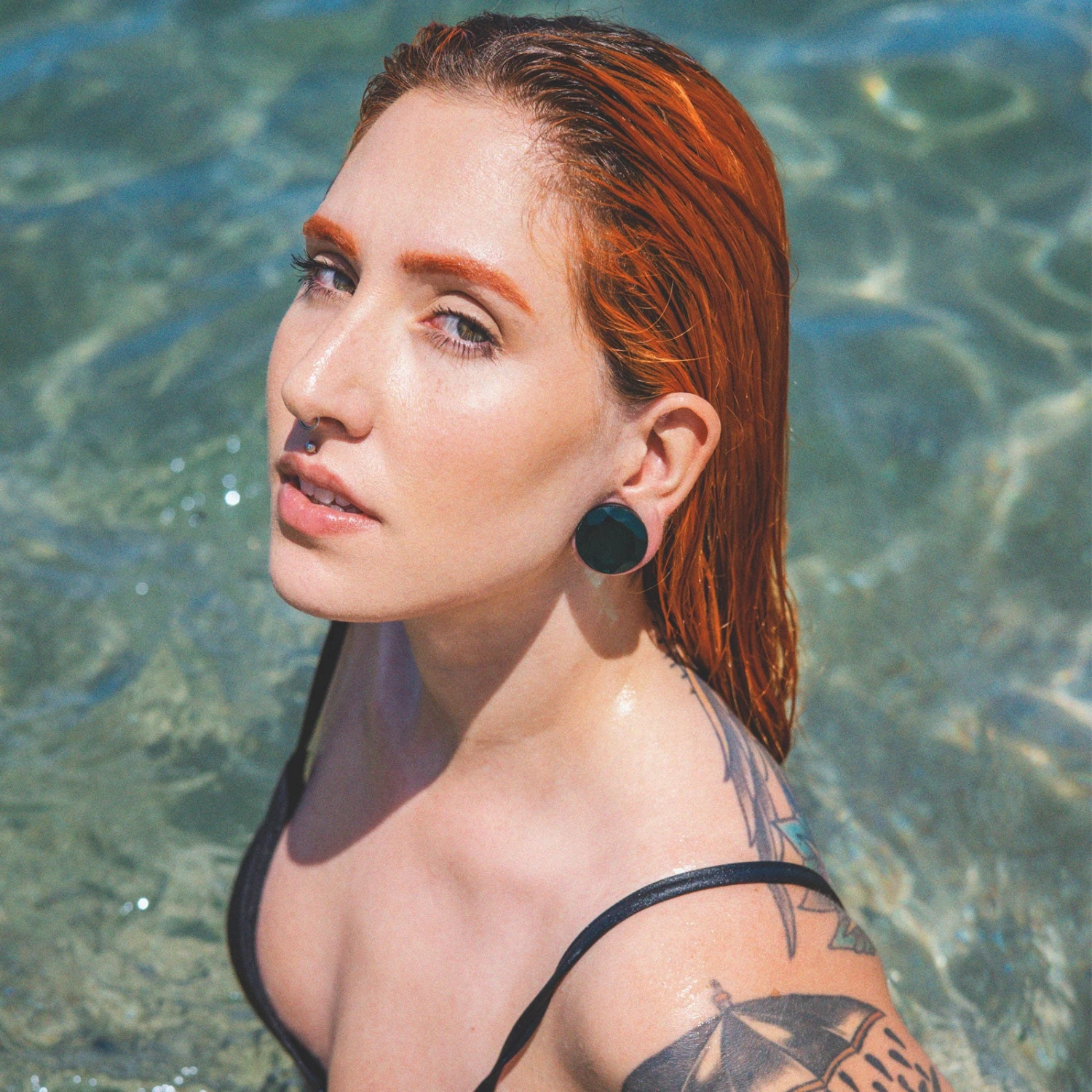 Faceted Teal Glass Double Flare Plug 4 Faceted Teal Glass Double Flare Plug - Image 2