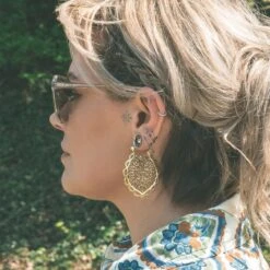 Flower Drop Brass Plug Hoops -Stretch It Body Jewellery flower drop brass plug hoops model shot side shot