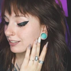 Green Cat's Eye Glass Double Flare Plug 8 Green Cat's Eye Glass Double Flare Plug -Stretch It Body Jewellery green cats eye glass double flare plug model shot female