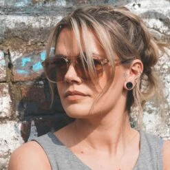 Jet Black Glass Double Flare Concave Tunnel 10 Jet Black Glass Double Flare Concave Tunnel -Stretch It Body Jewellery jet black glass double flare concave tunnel model shot close up