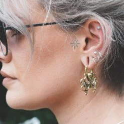 Kraken Hinged Clicker Brass Plug Hoops 8 Kraken Hinged Clicker Brass Plug Hoops -Stretch It Body Jewellery kraken hinged clicker brass plug hoops model shot close up