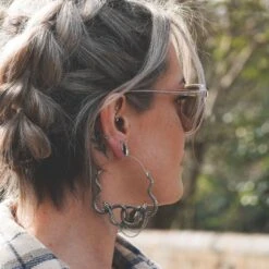 Linked Snakes Antique Silver Plug Hoops With Dangle Chain -Stretch It Body Jewellery linked snakes antique silver plug hoops with dangle chain model shot close up