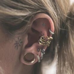 Octopus Brass Ear Cuff 8 Octopus Brass Ear Cuff -Stretch It Body Jewellery octopus brass ear cuff model shot close up