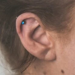 Pacific Blue Front Facing Synth Opal Titanium Threadless Top 8 Pacific Blue Front Facing Synth Opal Titanium Threadless Top -Stretch It Body Jewellery pacific blue front facing synth opal titanium threadless top model shot