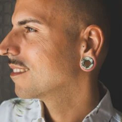 Peace Jade Double Flare Concave Stone Tunnel 8 Peace Jade Double Flare Concave Stone Tunnel -Stretch It Body Jewellery peace jade double flare concave stone tunnel model shot close up