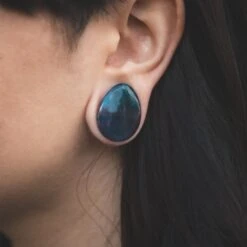 Rainbow Fluorite Double Flare Convex Teardrop Plug 8 Rainbow Fluorite Double Flare Convex Teardrop Plug -Stretch It Body Jewellery rainbow fluorite double flare convex teardrop plug model shot close up