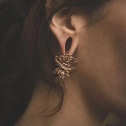 Rose And Vine Rose Gold PVD Ear Weight 8 Rose And Vine Rose Gold PVD Ear Weight -Stretch It Body Jewellery rose and vine rose gold pvd ear weight model shot closeup