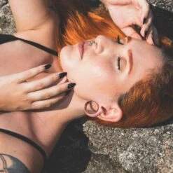 Rose Gold PVD Single Flare Tunnel -Stretch It Body Jewellery rose gold pvd single flare tunnel model shot