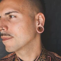 Saba Wood Double Flare Tunnel With Coconut Wood Offset Inlay -Stretch It Body Jewellery saba wood double flare tunnel with coconut wood offset inlay model shot