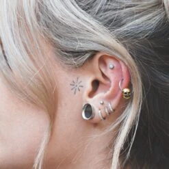 Skull Brass & Surgical Steel BCR Ball Closure Ring -Stretch It Body Jewellery skull brass surgical steel bcr ball closure ring model shot