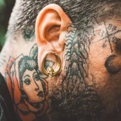 Skull Gold PVD Saddle Plug Ear Weight 9 Skull Gold PVD Saddle Plug Ear Weight -Stretch It Body Jewellery skull gold pvd saddle plug ear weight close up