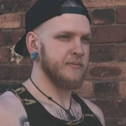 Snowflake Obsidian Double Flare Stone Plug -Stretch It Body Jewellery snowflake obsidian double flare stone plug model shot close up