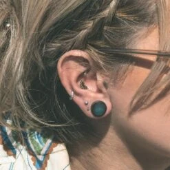 Sono Wood Double Flare Plug With Black MOP Inlay -Stretch It Body Jewellery sono wood double flare plug with black mop inlay model shot close up