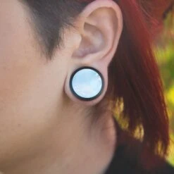 Sono Wood Double Flare Plug With MOP Inlay 9 Sono Wood Double Flare Plug With MOP Inlay -Stretch It Body Jewellery sono wood double flare plug with mop inlay model shot close up