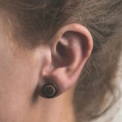 Sono Wood Fake Gauge Plug With Coconut & Crocodile Wood Halo Inlay -Stretch It Body Jewellery sono wood fake gauge plug with coconut crocodile wood halo inlay model shot