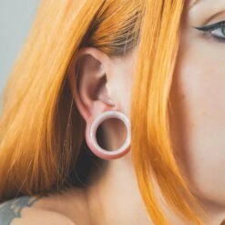 White Pearl Silicone Double Flare Tunnel -Stretch It Body Jewellery white pearl silicone double flare tunnel model shot close up