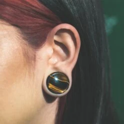 Yellow Tiger's Eye Double Flare Concave Plug -Stretch It Body Jewellery yellow tiger s eye double flare concave plug model shot close up