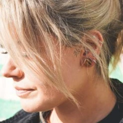 Yellow Tiger's Eye Single Flare Convex Stone Plug 12 Yellow Tiger's Eye Single Flare Convex Stone Plug -Stretch It Body Jewellery yellow tigers eye single flare plug model shot side shot